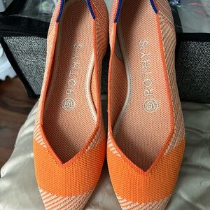 Rothy's Vibrant Orange Flats with Blue Accents
